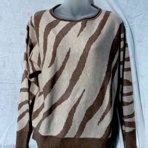 This sweater is zebra print it’s very cute